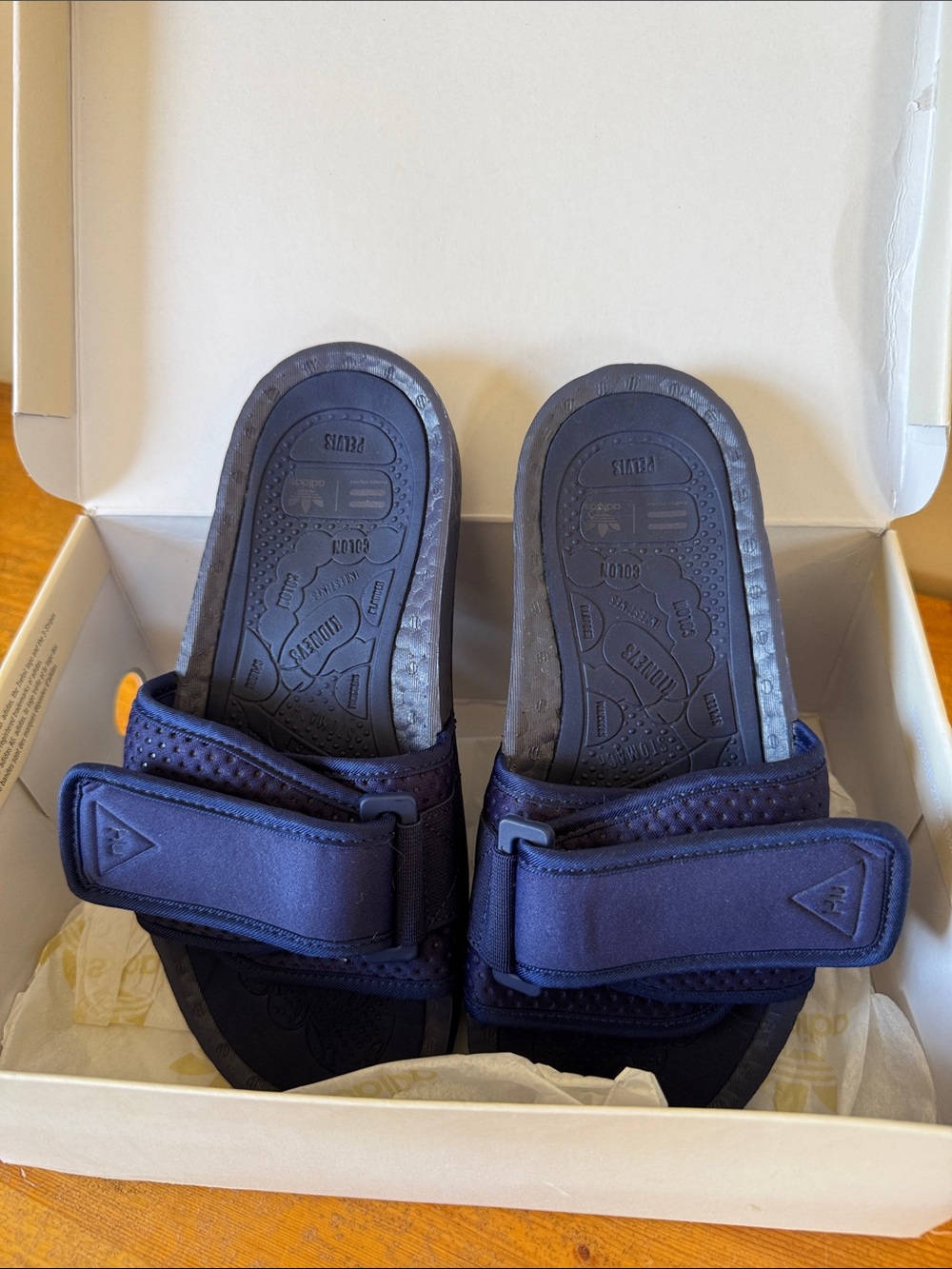 Adidas x Pharrell Williams Human Race Chancletas Boost Slides in “Night Sky”